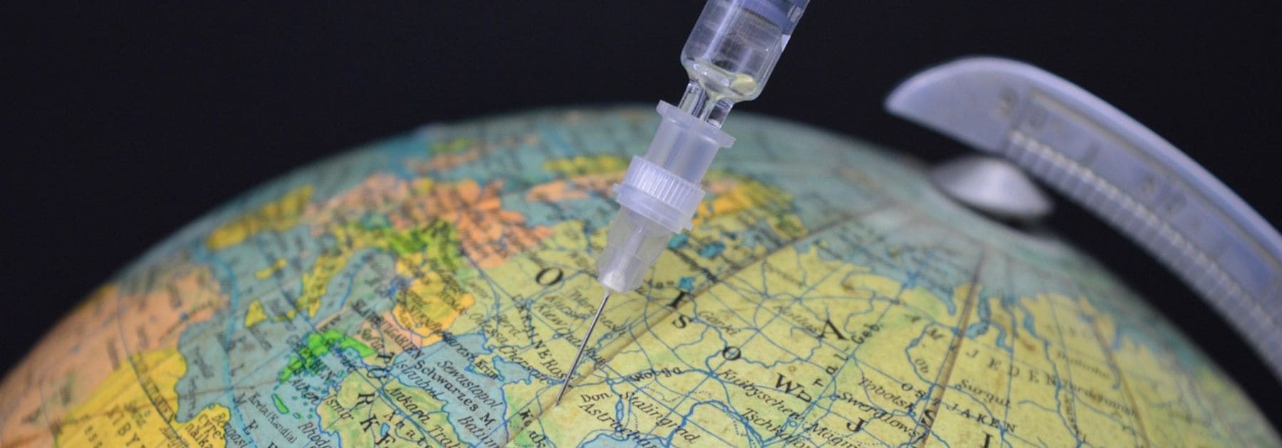 globe-with-travel-vaccination-from travel-clinic