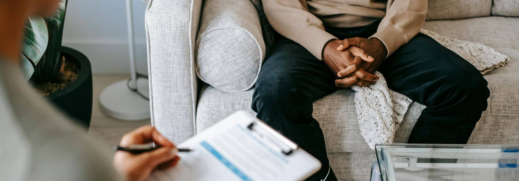 patient receiving advice at travel clinic in London
